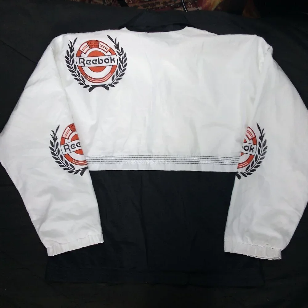 Vintage 80s Reebok Crest Logo Windbreaker Jacket